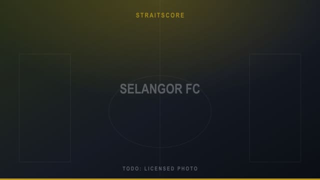Placeholder image standing in for a photograph of Selangor FC players celebrating at Selayang Stadium.